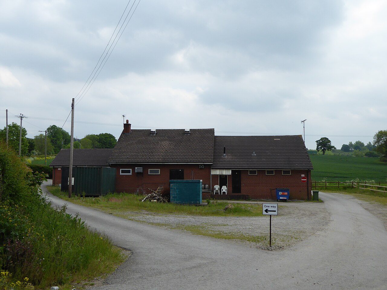 The Alsager Golf & Country Club building beside its approach road